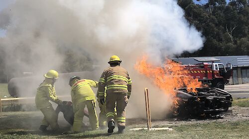 Expeditioners save a mock patient from the flames