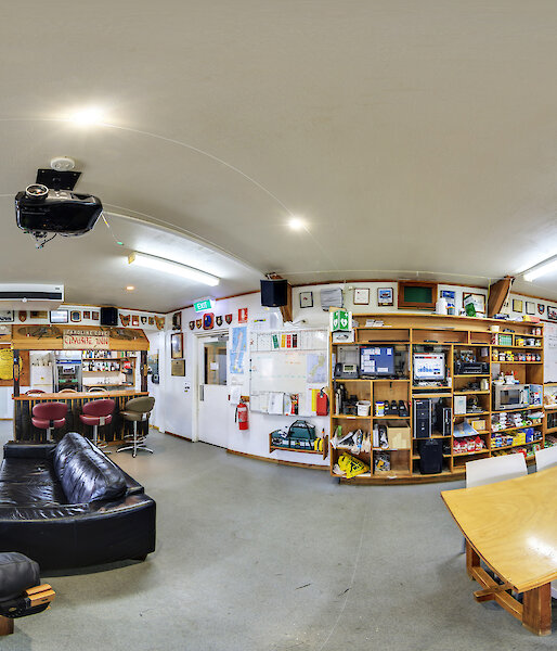 A 360 degree panoramic image of Macquarie Island research station’s kitchen, dining and living area from the virtual tour.