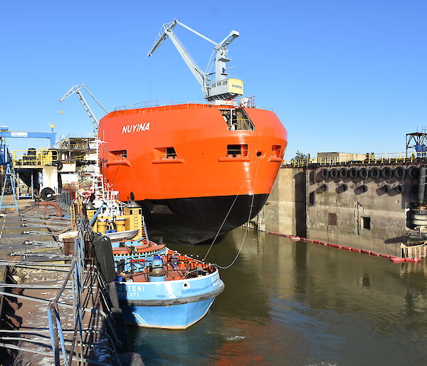 The ship in the wet dock being prepared to move out into the River Danube.