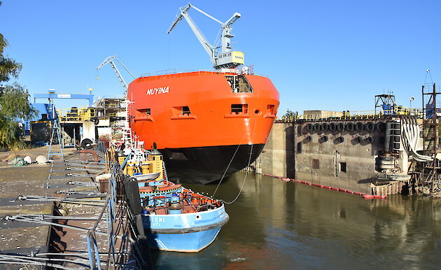 The ship in the wet dock being prepared to move out into the River Danube.