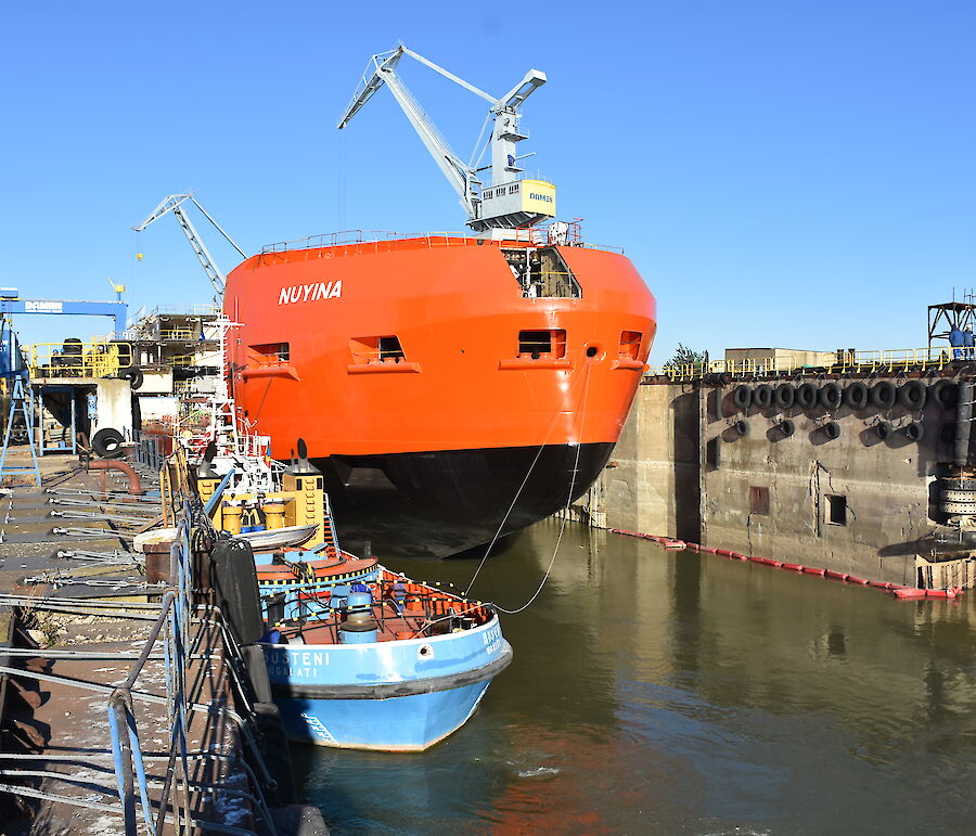 The ship in the wet dock being prepared to move out into the River Danube.