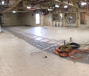 A large space that will become the dining room and kitchen.