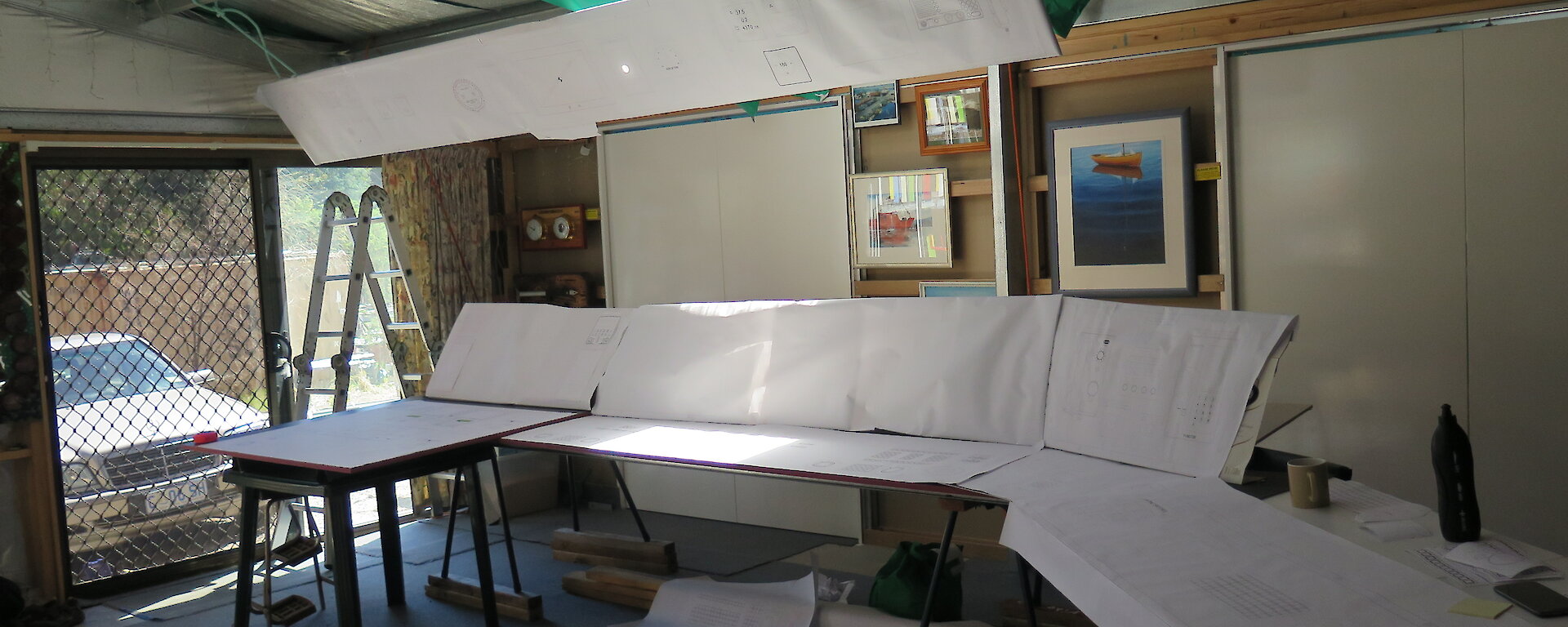 A paper version of the Nuyina bridge, mocked up with instruments printed to scale and mounted at the same height and distance as they would appear on the ship. This section shows the central console and instruments to its right.