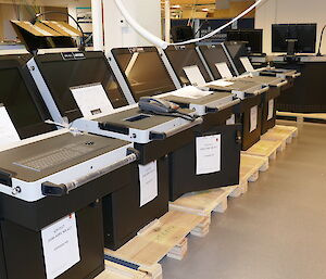 These scientific consoles display a weather radar, ice/wave radar, CCTV and satellite information.