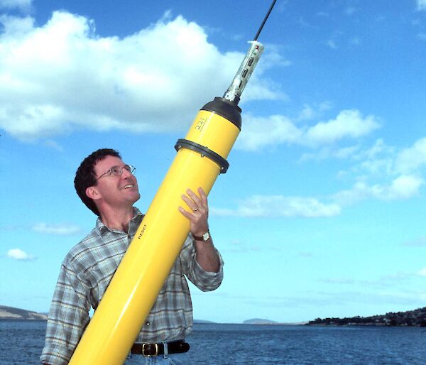 Scientist holding the Argo float