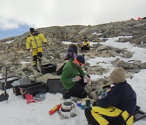 Expeditioners cooking dinner.