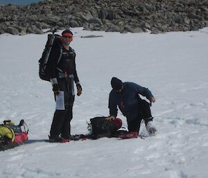 Expeditioner with foot stuck in the snow