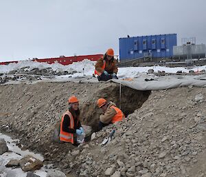 The remediation team taking samples from cuts made into a biopile