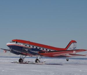 Basler aircraft landing at the skiway