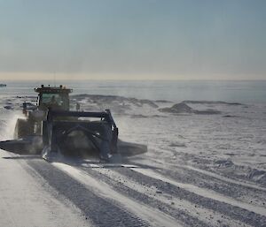 Grooming a snow road