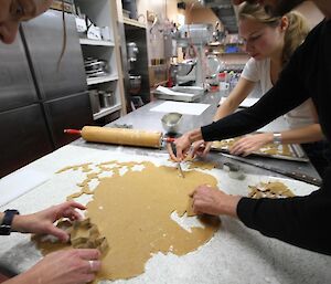 Expeditioners helping in the kitchen