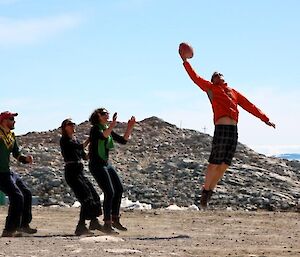 Expeditioners playing football