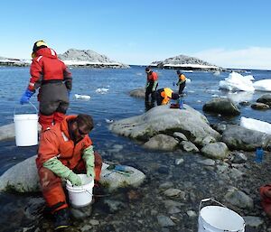 Taking marine science samples in shallow waters