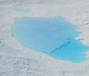 Melt lake on top of an ice berg