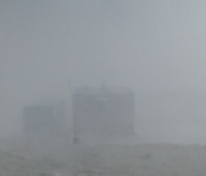 A building is barely-visible through a record blizzard