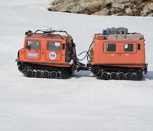 Large red Hagg vehicle on the ice