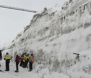 Harnessing up for ice climbing