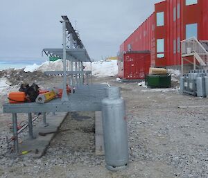 Relocated smokers hut and kitchen gas rack, now on the southern side of the Red Shed