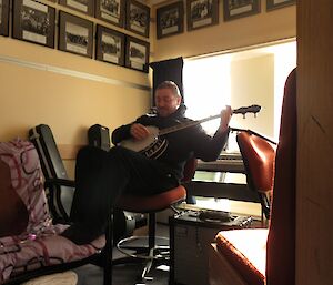 Mark and his banjo in the music corner (where we can’t hear him)