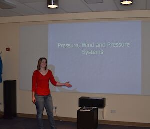 Annalise at the front of the Odeon about to start a lecture on wind and pressure systems