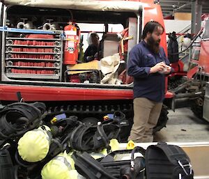 Jeb (BA3 and Summer Fire Chief) checking through the breathing apparatus stocks