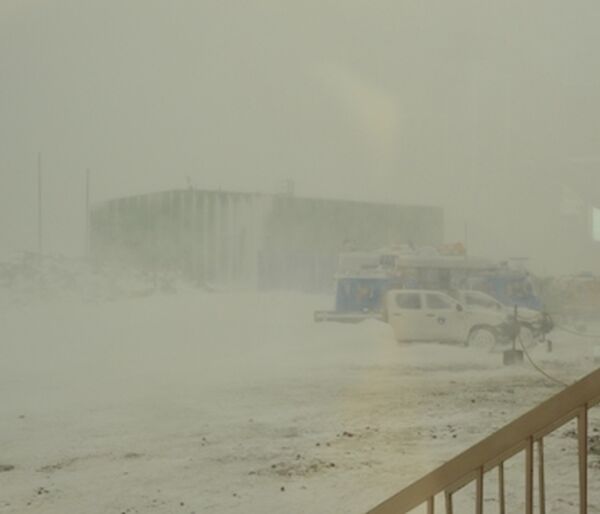 Blowing snow at Casey reduces visibility of buildings