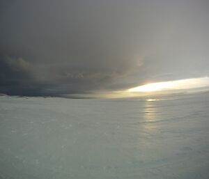 Scenery with ice and incoming cloud