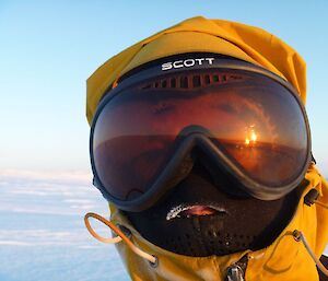 Gavin’s face covered in gear to keep out cold wind