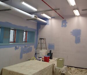 Painting trades office shows splotches of blue here and there