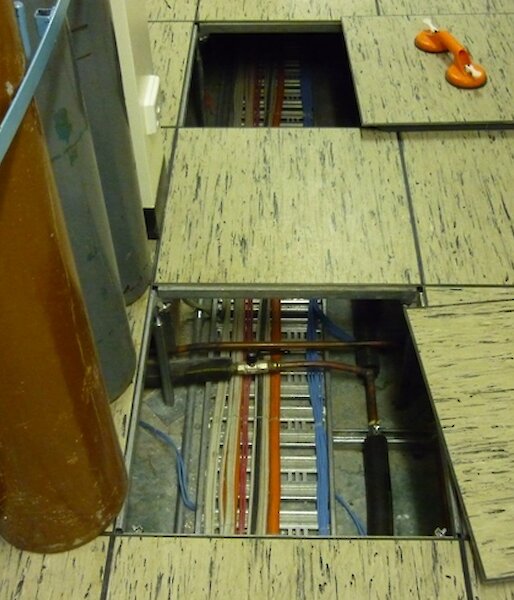 Access to the subfloor is straightforward through the modular floor