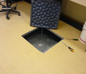 Science electrical at Casey shows square hole in floor for access