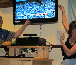 Blues supporters Craig and Misty helping the Maroons supporters with the Game 2 final score on our low resolution satellite feed