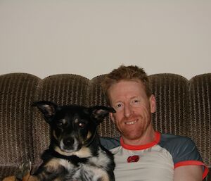 Jamie Lowe and his dog at home in Australia