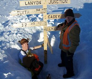Jamie Lowe and the McEvoy brothers fixing the Lanyon Junction sign
