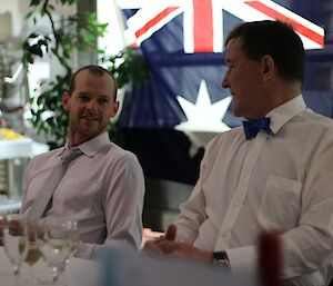 Mike and Dave having a chat between courses at midwinter dinner