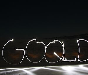 Qld sign made by head torches at night