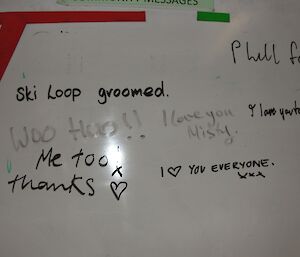 Whiteboard messages about grooming the ski loop at Casey