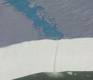 Waterfall over a glacier