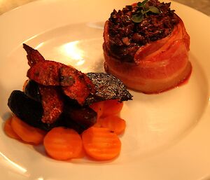 Smoked beef fillet with crushed olives and beetroot chips