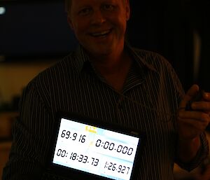 Andy Burgess with a computer clock