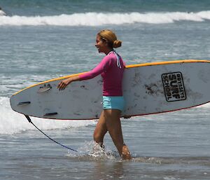 Sheri surfing in Indonesia