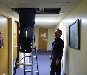 Jamie and Phill fixing a humidifier