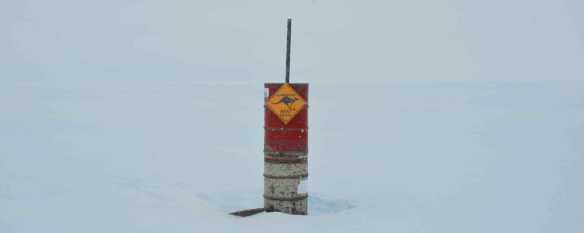 Drum stack marking a waypoint on a hut route