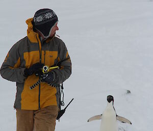 Gav interacting with a penguin