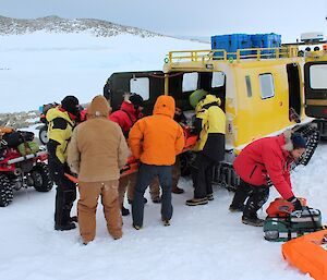 The patient is moved into the back of the SAR Hagg or transport to station