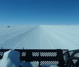 View down the ski landing area from inside the snow groomer