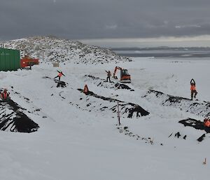 Remediation team back on the MPH site digging out barriers and biopile from the snowy winter