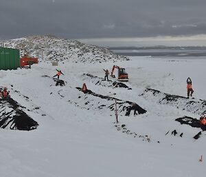 Remediation team back on the MPH site digging out barriers and biopile from the snowy winter