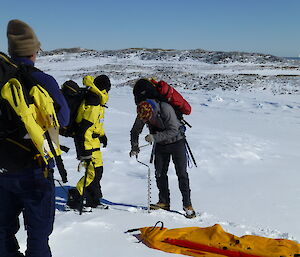 Drilling the sea ice in Shirley Channel