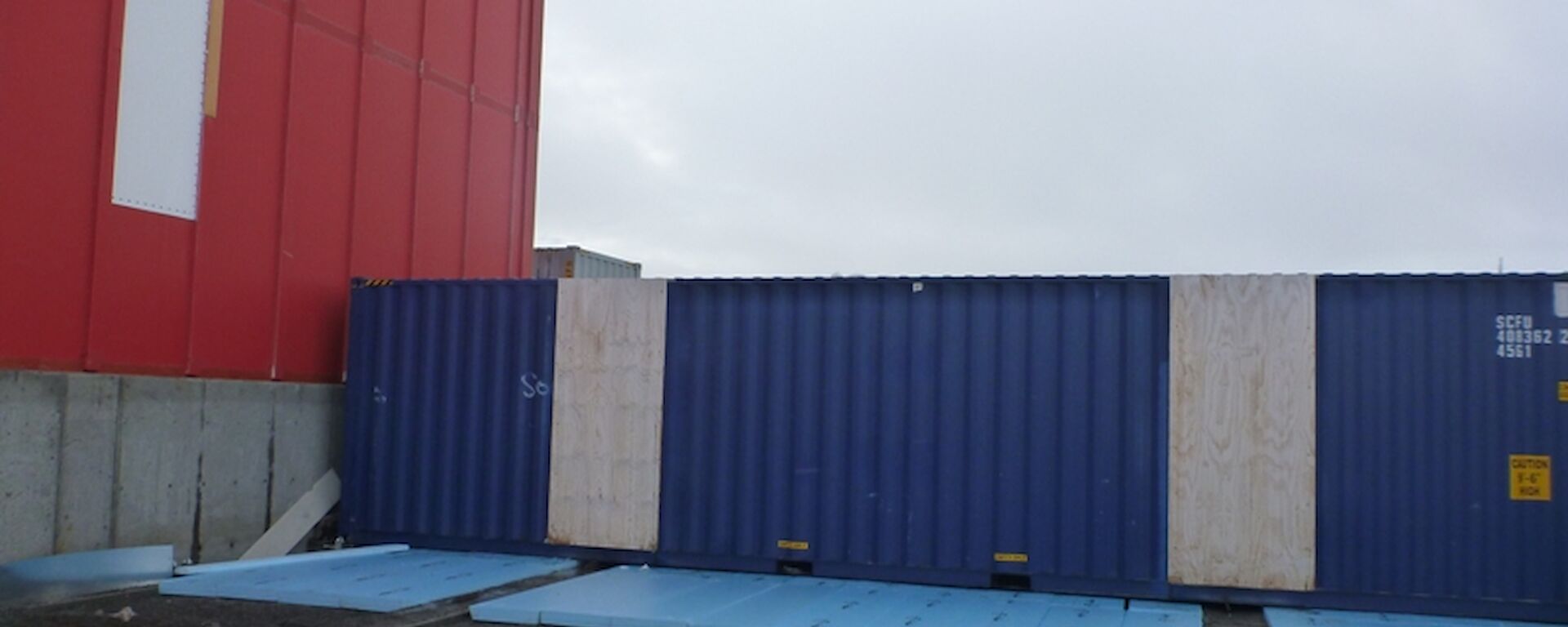 The first containers that form the building blocks of the new east wing have been put in place